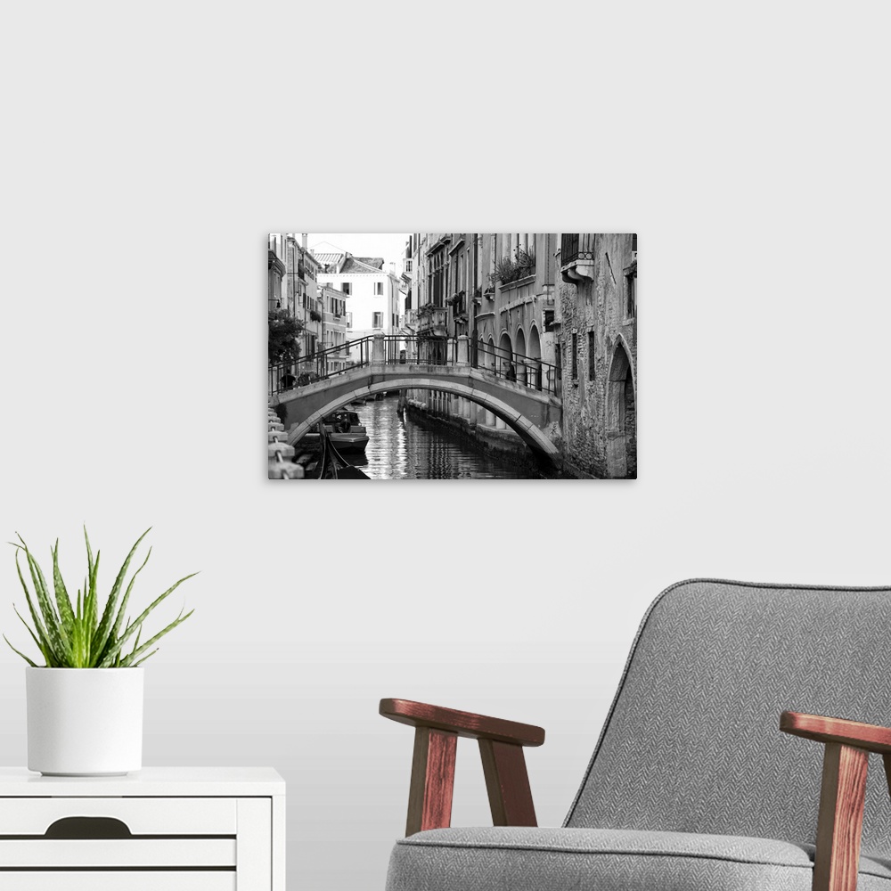 A modern room featuring View of  Venice, Italy in black and white.