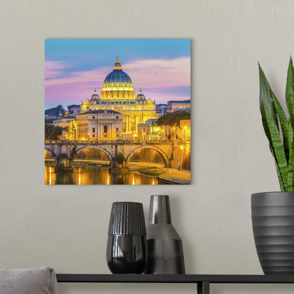 A modern room featuring Night view of old roman bridge of Hadrian and St. Peters cathedral in Vatican city Rome, Italy.