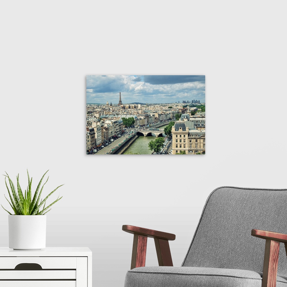 A modern room featuring View of Paris form the Notre Dame.