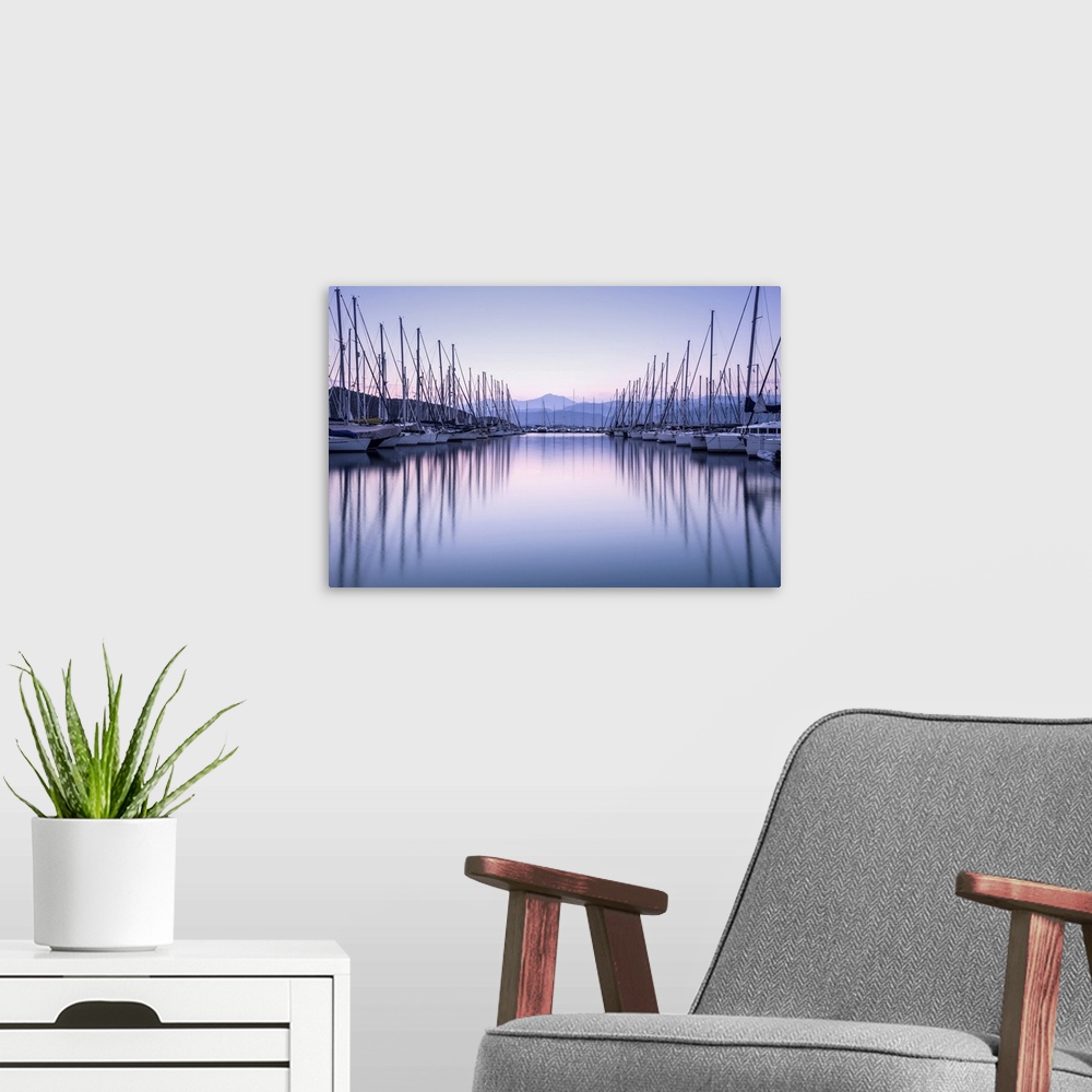 A modern room featuring Large yacht harbor in purple sunset light, luxury summer cruise, sailboats in sunrise, leisure ti...