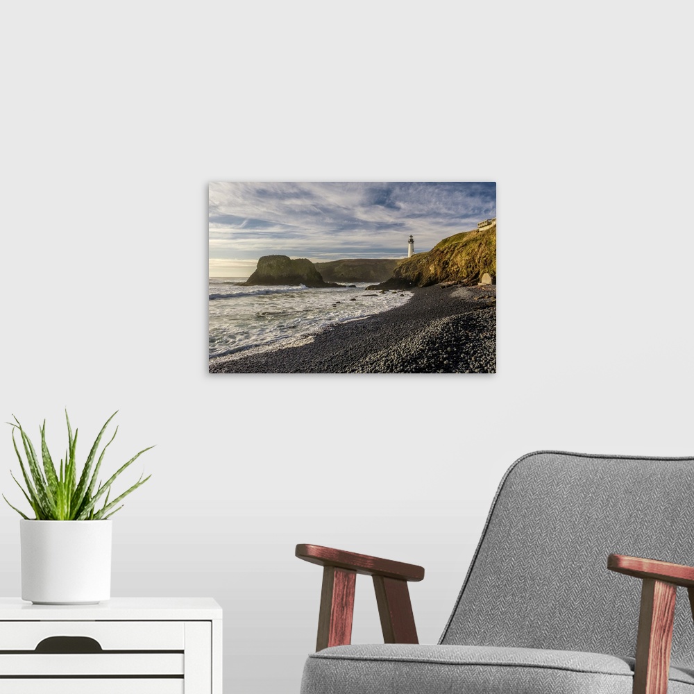 A modern room featuring Yaquina Head Lighthouse