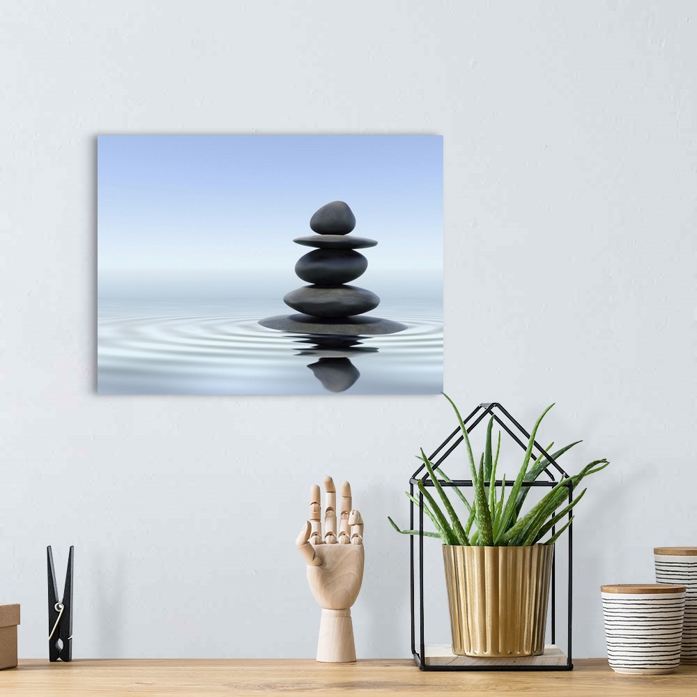 A bohemian room featuring Zen stones in water.