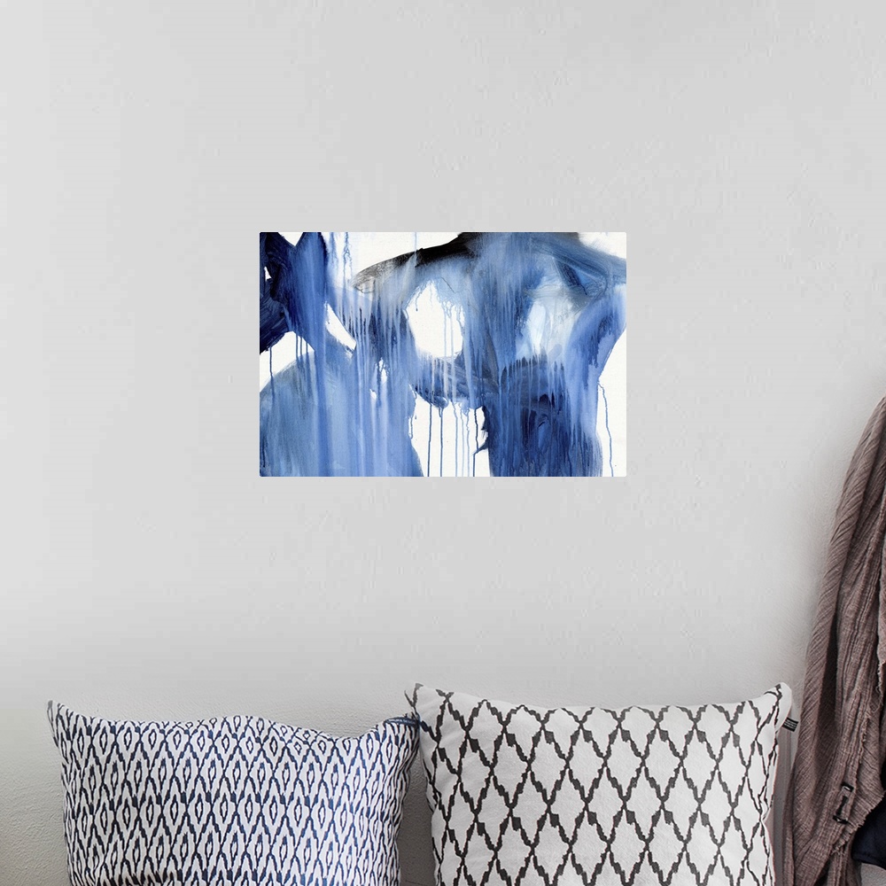A bohemian room featuring Contemporary artwork in shades of blue over white with a dripping paint appearance.