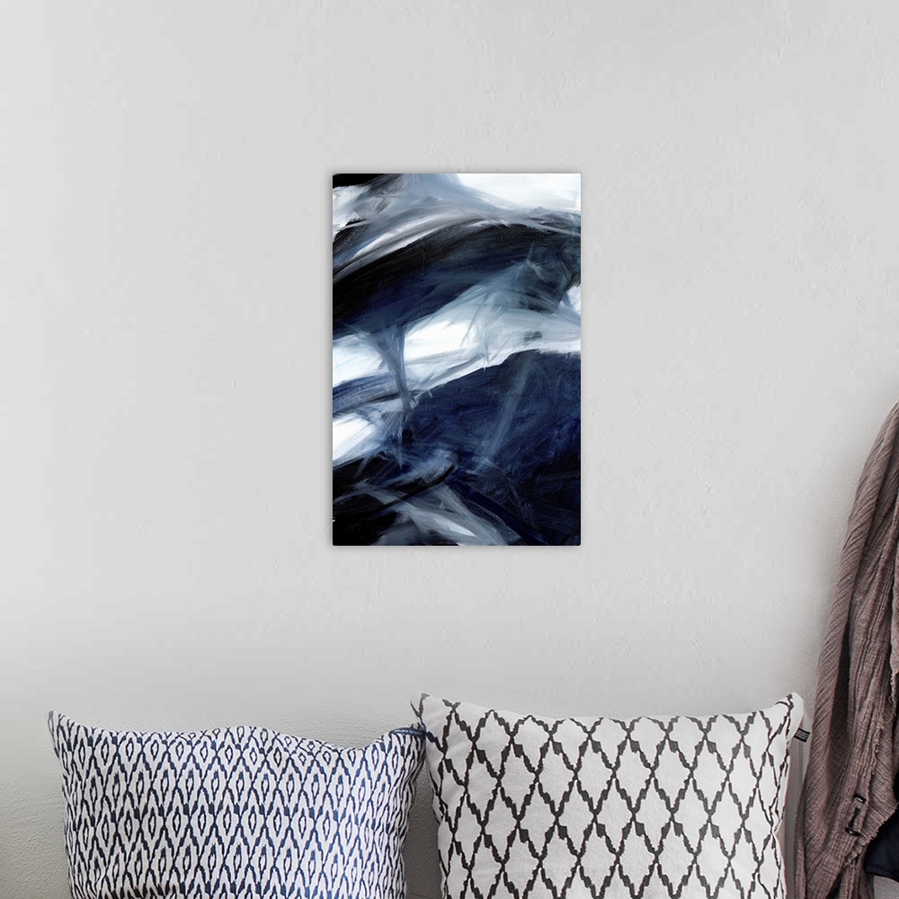 A bohemian room featuring Contemporary abstract artwork in dark shades of grey and blue with small areas of white.
