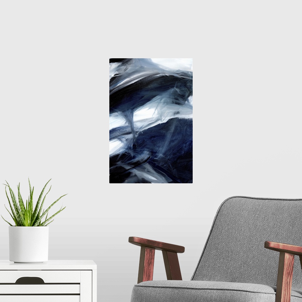A modern room featuring Contemporary abstract artwork in dark shades of grey and blue with small areas of white.