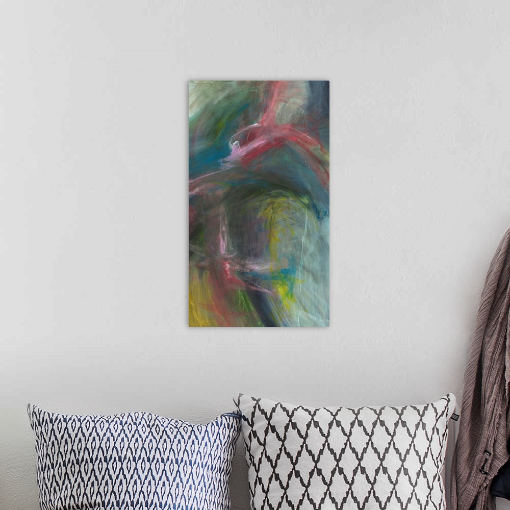 A bohemian room featuring Large abstract art with dark and muted hues in shades of pink, yellow, blue, and green.
