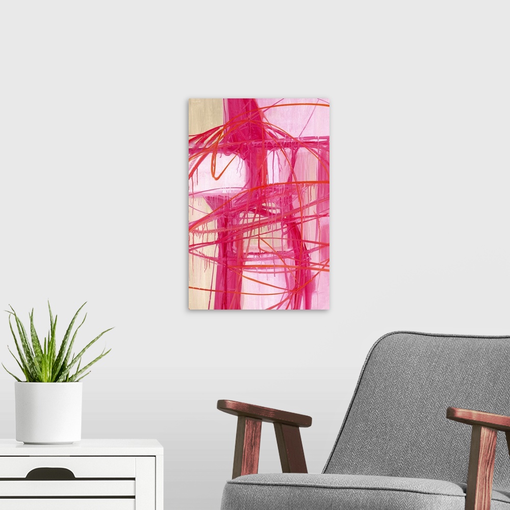 A modern room featuring Contemporary abstract artwork in pink shades with broad strokes of paint with a dripping appearance.