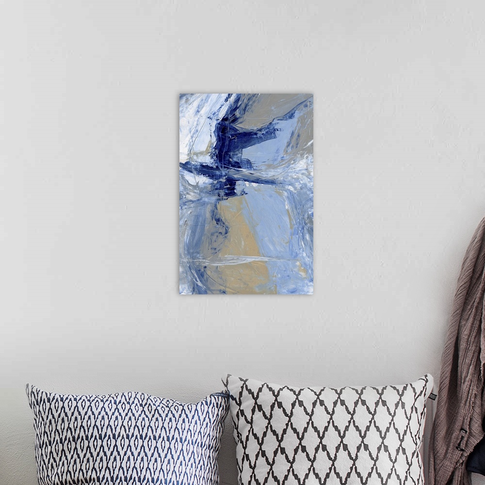 A bohemian room featuring A contemporary abstract painting using various blue tones in aggressive strokes.
