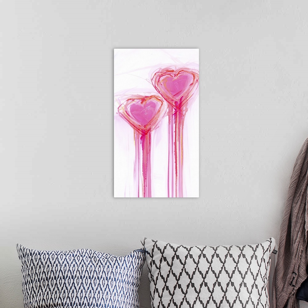 A bohemian room featuring Contemporary painting of two bright pink heart shapes with long streaks of dripping paint.