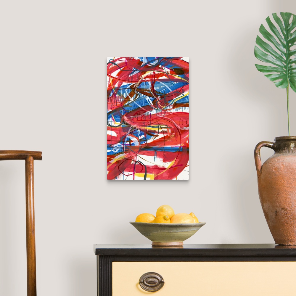 A traditional room featuring Large abstract painting with red, blue, magenta, yellow, orange, and white lines varying in size ...
