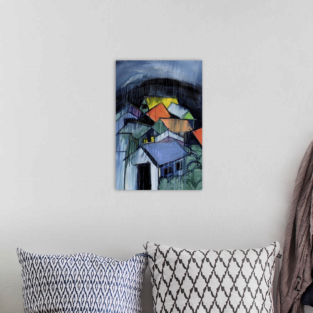 A bohemian room featuring A contemporary abstract painting of a cluster of houses with colorful roofs under a dark blue dri...
