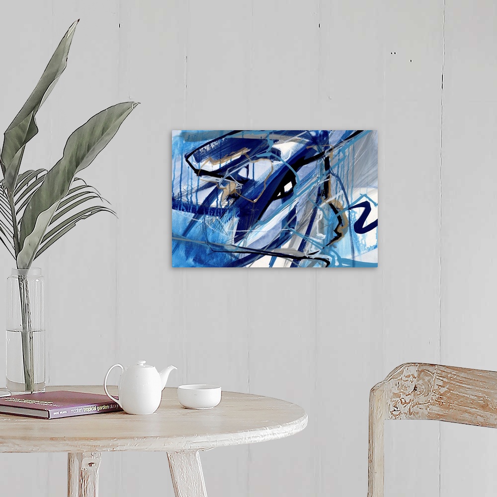 A farmhouse room featuring A contemporary abstract painting of a web made up of blue tones.
