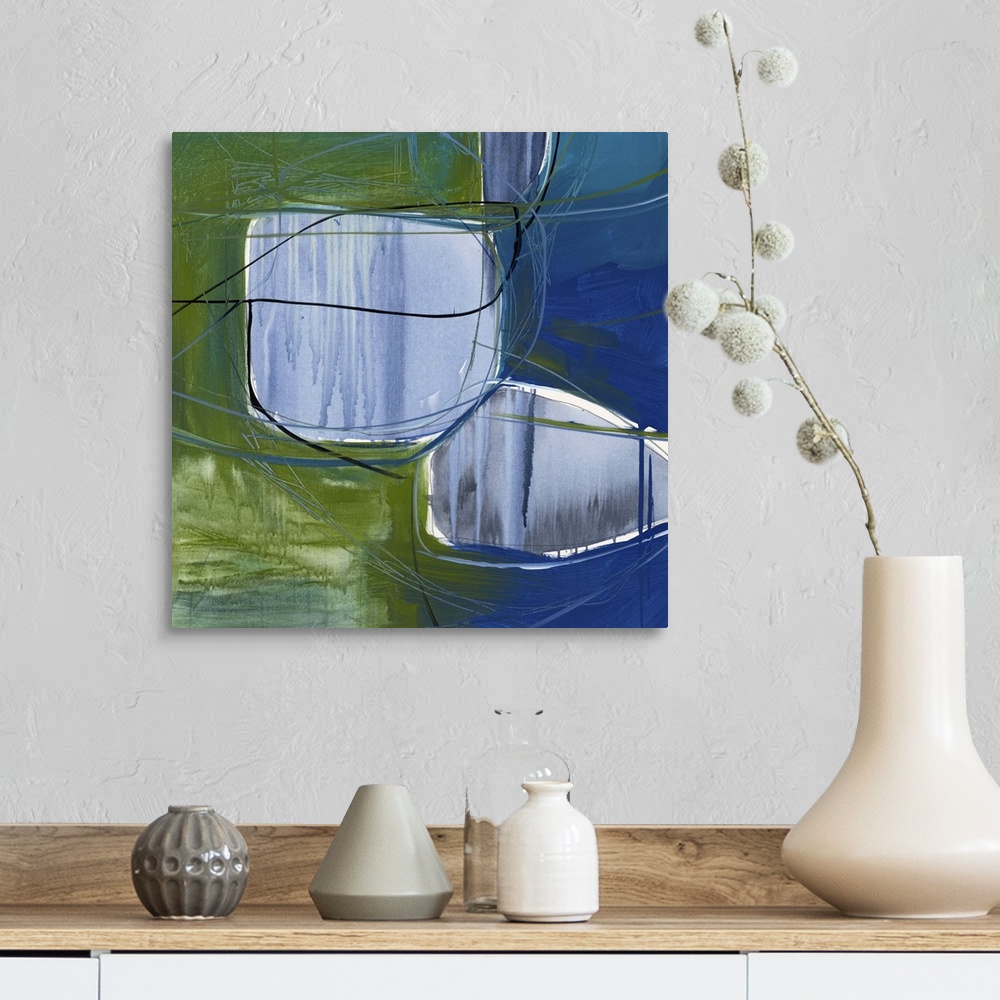 A farmhouse room featuring A contemporary abstract painting using pale and dark blue tones with green.
