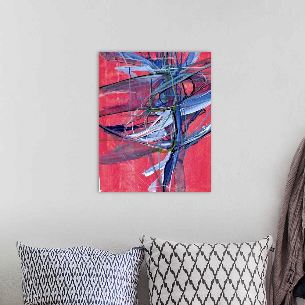 A bohemian room featuring Contemporary abstract artwork of wild blue and black strokes of paint over light red.