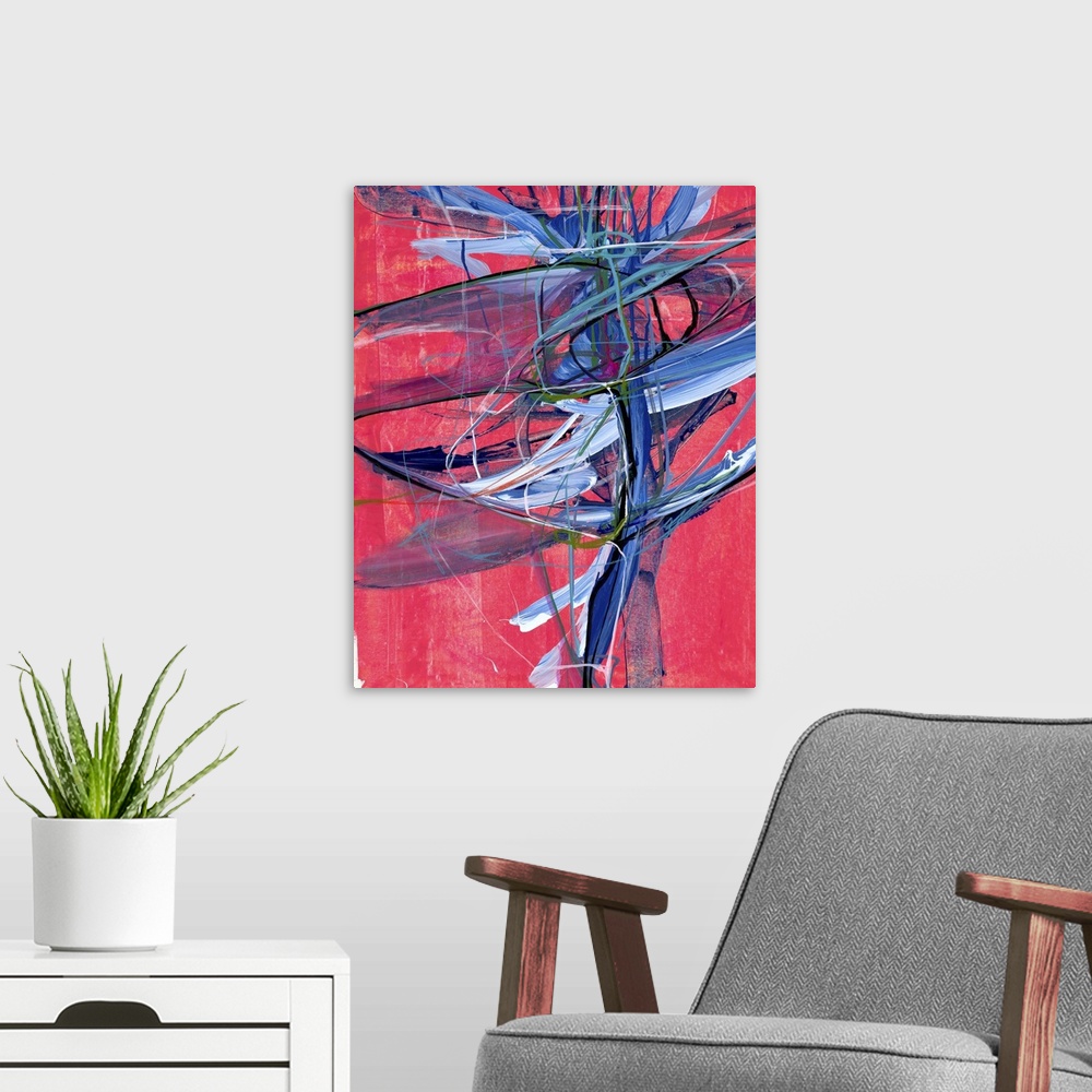 A modern room featuring Contemporary abstract artwork of wild blue and black strokes of paint over light red.