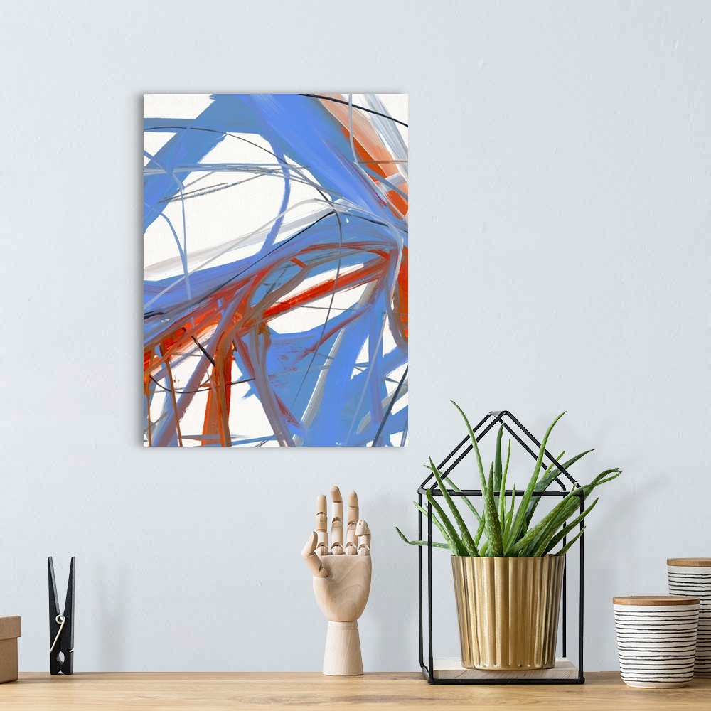 A bohemian room featuring Contemporary abstract painting in strong strokes of blue and red over white.