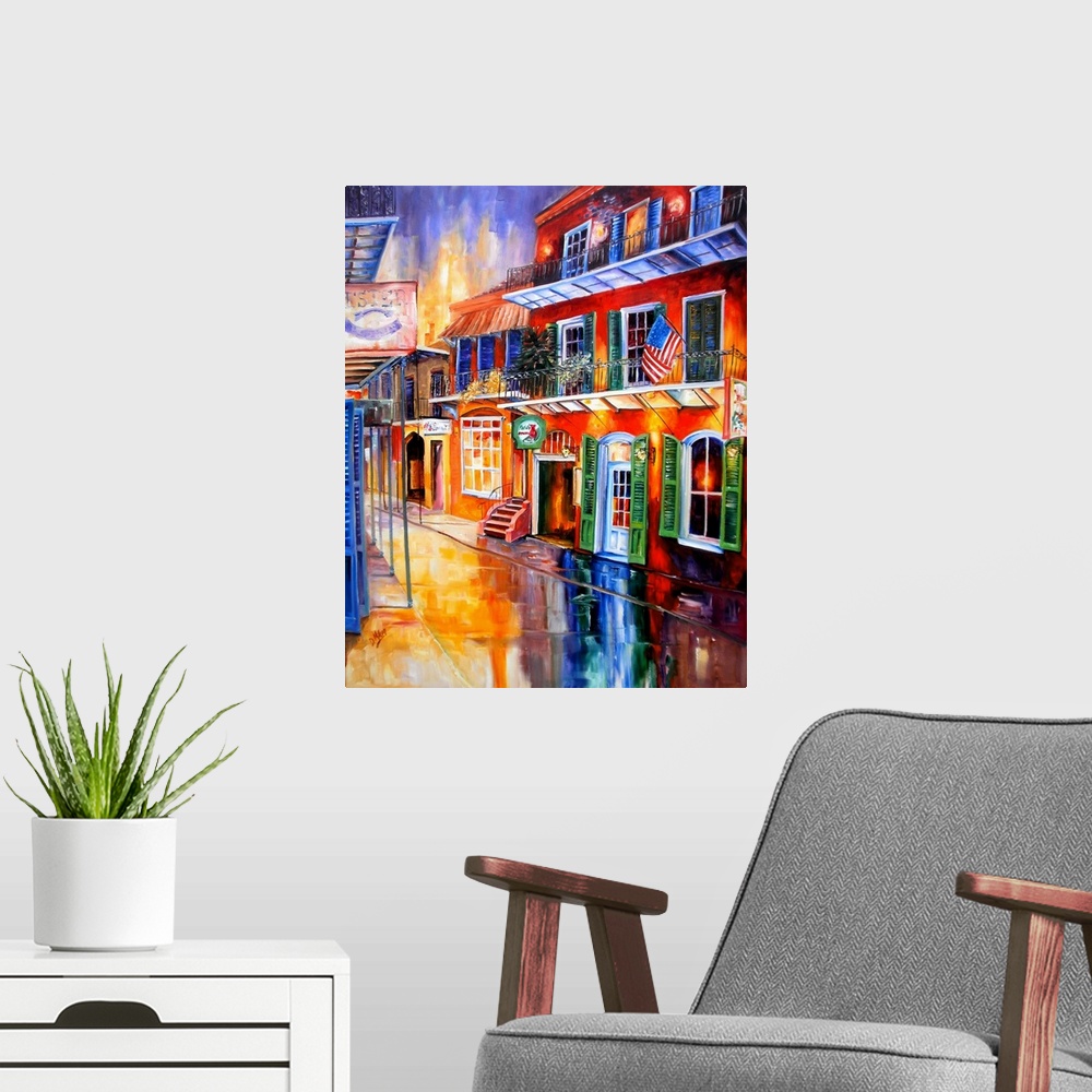A modern room featuring Piece of contemporary artwork that uses a rainbow of colors to paint a street in New Orleans line...