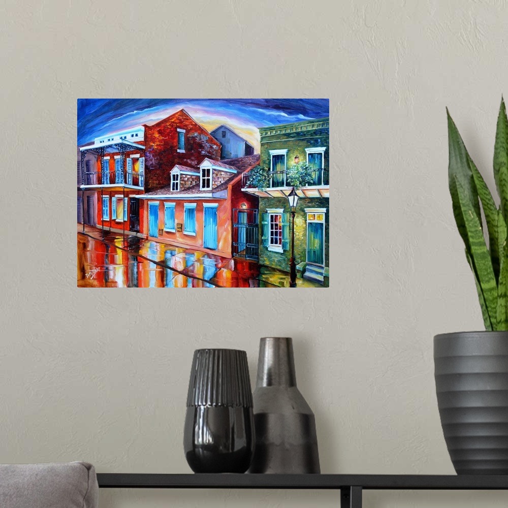 A modern room featuring Contemporary artwork of Burgundy Street in New Orleans with colorful buildings.