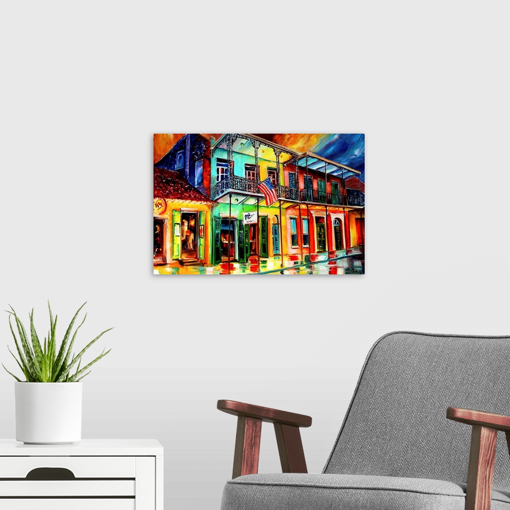 A modern room featuring Contemporary painting of wet city street lined with shops that have balconies.