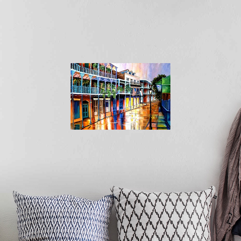 A bohemian room featuring Contemporary artwork of Royal Street in New Orleans with colorful buildings and white balconies.