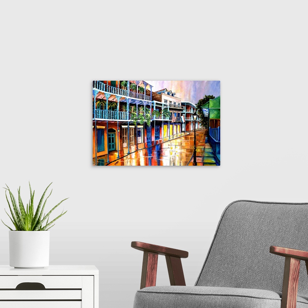 A modern room featuring Contemporary artwork of Royal Street in New Orleans with colorful buildings and white balconies.