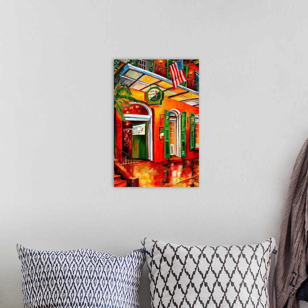 A bohemian room featuring Colorful contemporary painting of New Orleans' bourbon street in New Orleans, Louisiana.