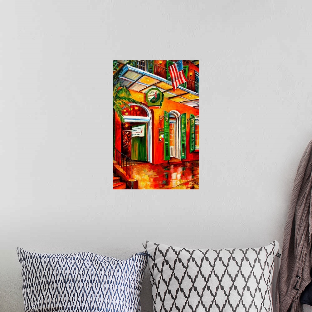 A bohemian room featuring Colorful contemporary painting of New Orleans' bourbon street in New Orleans, Louisiana.