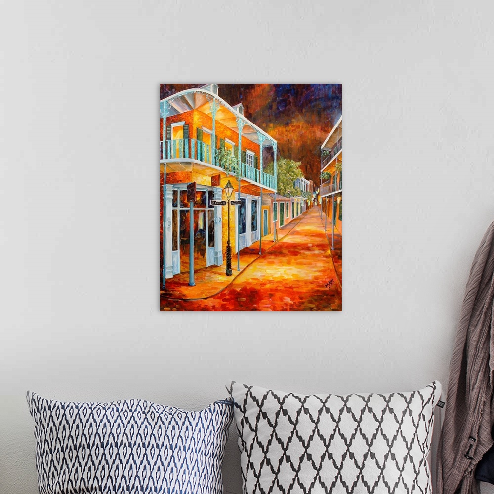 A bohemian room featuring Boldly colored contemporary painting of a historic part of the French Quarter in New Orleans.