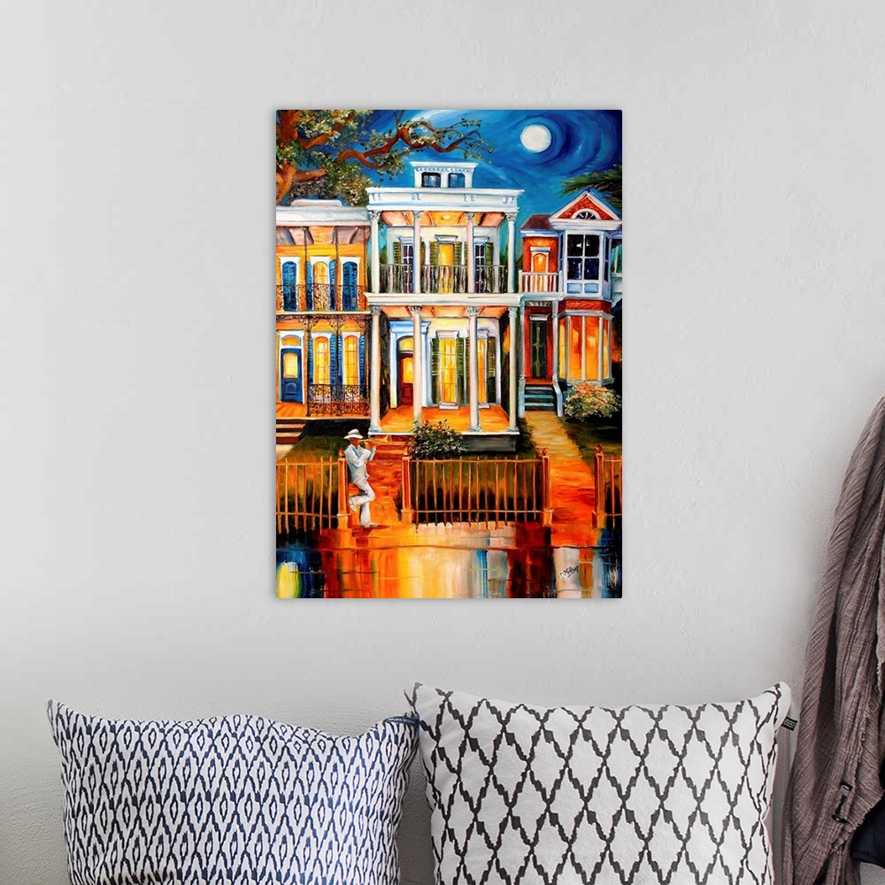 A bohemian room featuring A colorful work of art that shows three houses lining a street in New Orleans with a trumpet play...