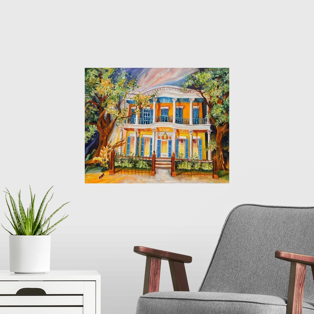 A modern room featuring Painting of a yellow house located in the Garden District in New Orleans, LA.