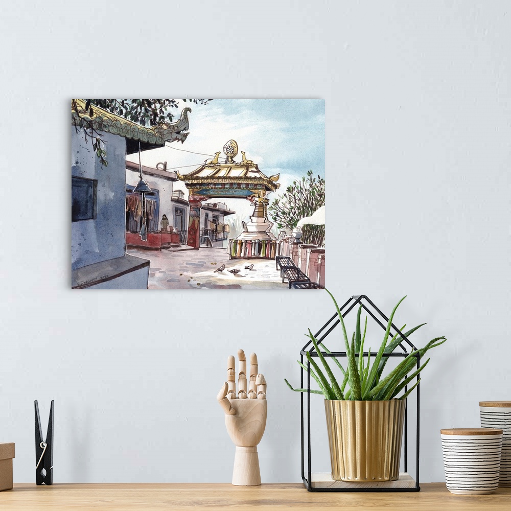 A bohemian room featuring A colorful and golden-crested arch frames the path through the pilgrimmage site, Namo Buddha, in ...