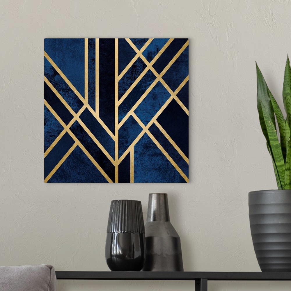 A modern room featuring A simple art deco design in gold lines on a background of mottled dark blue and navy