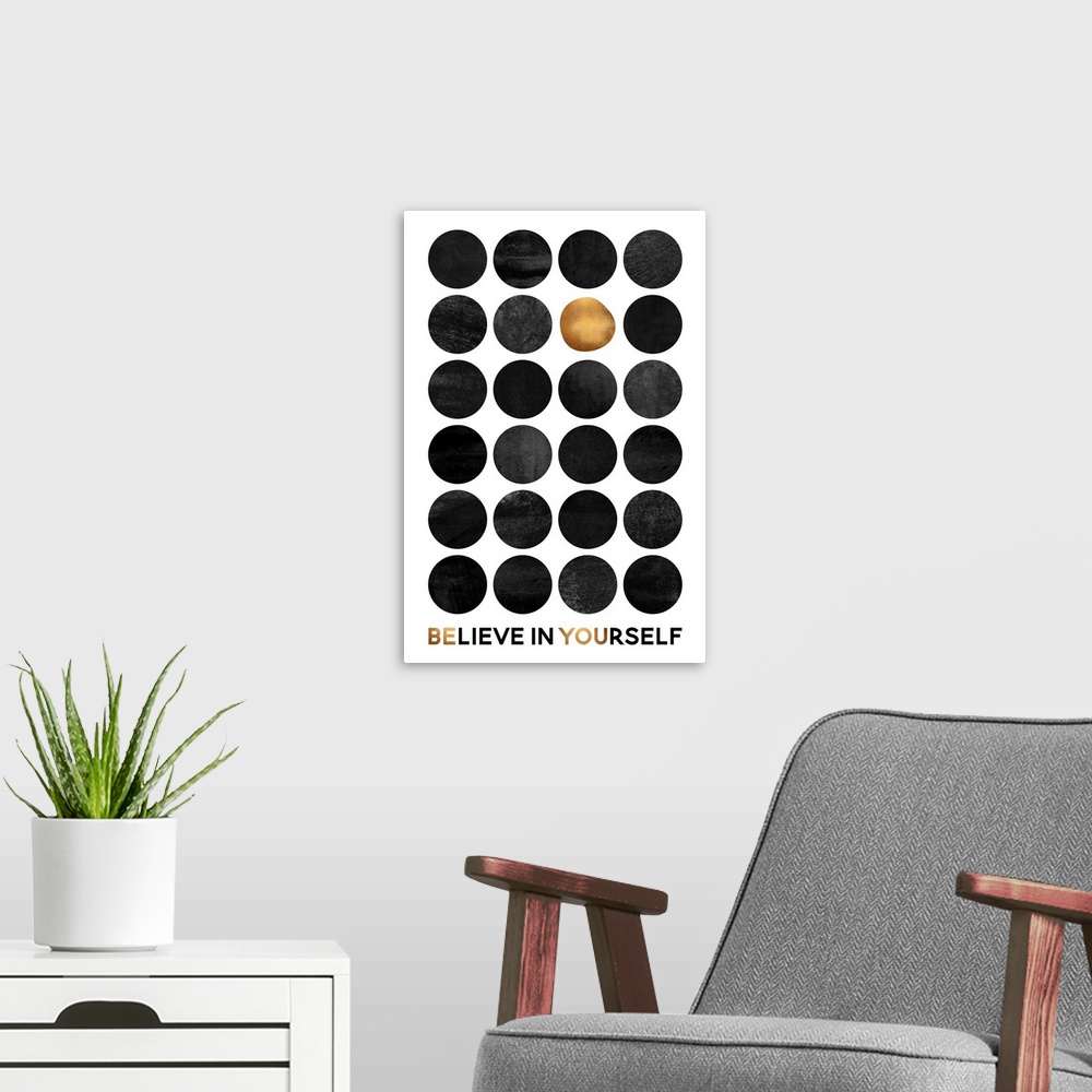 A modern room featuring A grid of dark grey circles with one gold circle on a white background, with the words Believe in...