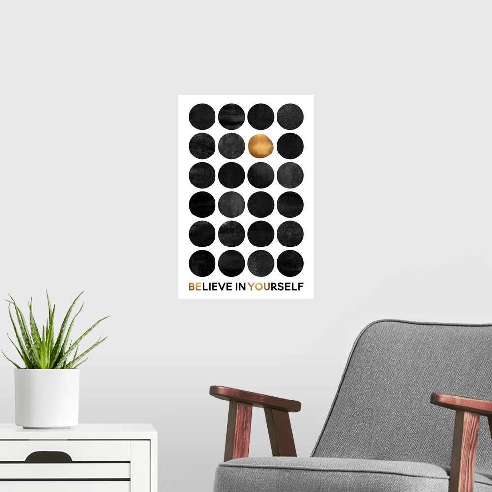 A modern room featuring A grid of dark grey circles with one gold circle on a white background, with the words Believe in...