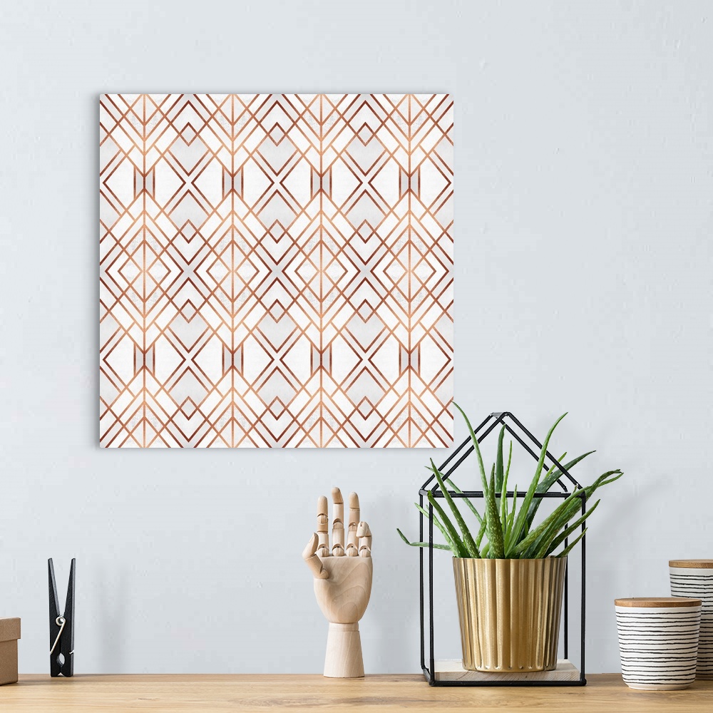 A bohemian room featuring A geometric, ikat-type design in shades of white and grey, outlined in copper lines.