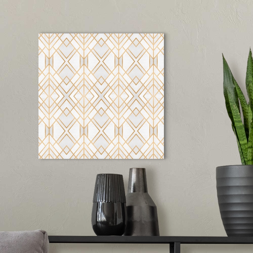 A modern room featuring A geometric, ikat-type design in shades of white and grey, outlined in gold lines.