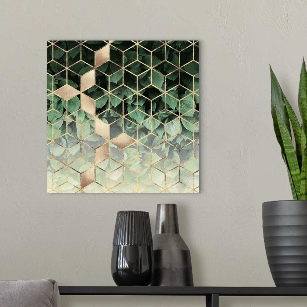 A modern room featuring A prism of gold triangles form a three-dimensional prism effect over the image of dark green host...