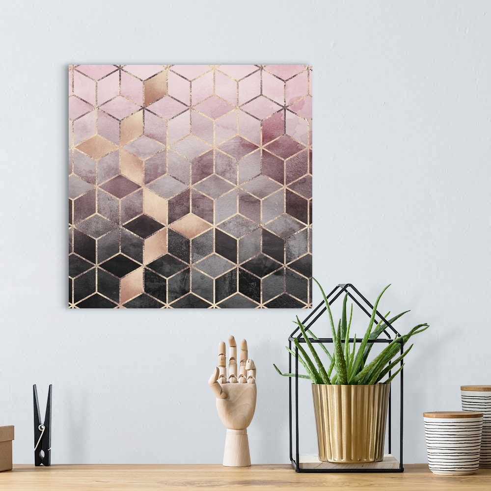 A bohemian room featuring A prism of triangles in various shades of textured rose gold and grey are arranged in to form a t...
