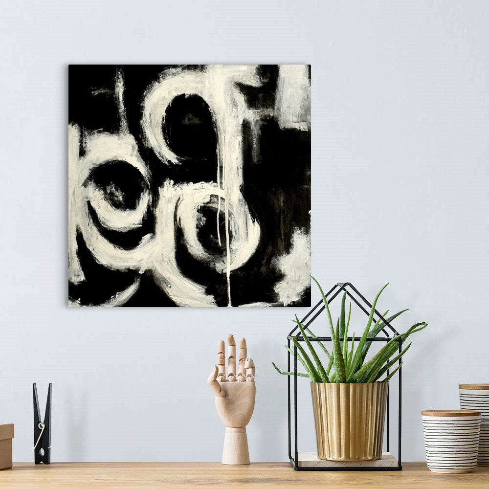 A bohemian room featuring Contemporary abstract painting of lightly colored curves and lines resembling letters against a d...