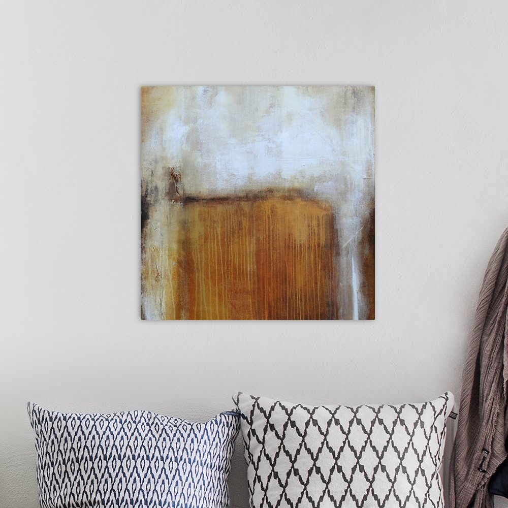 A bohemian room featuring Contemporary color field style painting using earth tones.