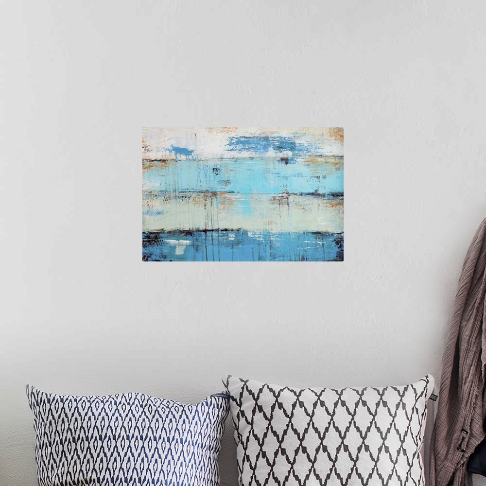 A bohemian room featuring A contemporary abstract painting of horizontal panels with cool, blue, hues.  The wood-like backg...