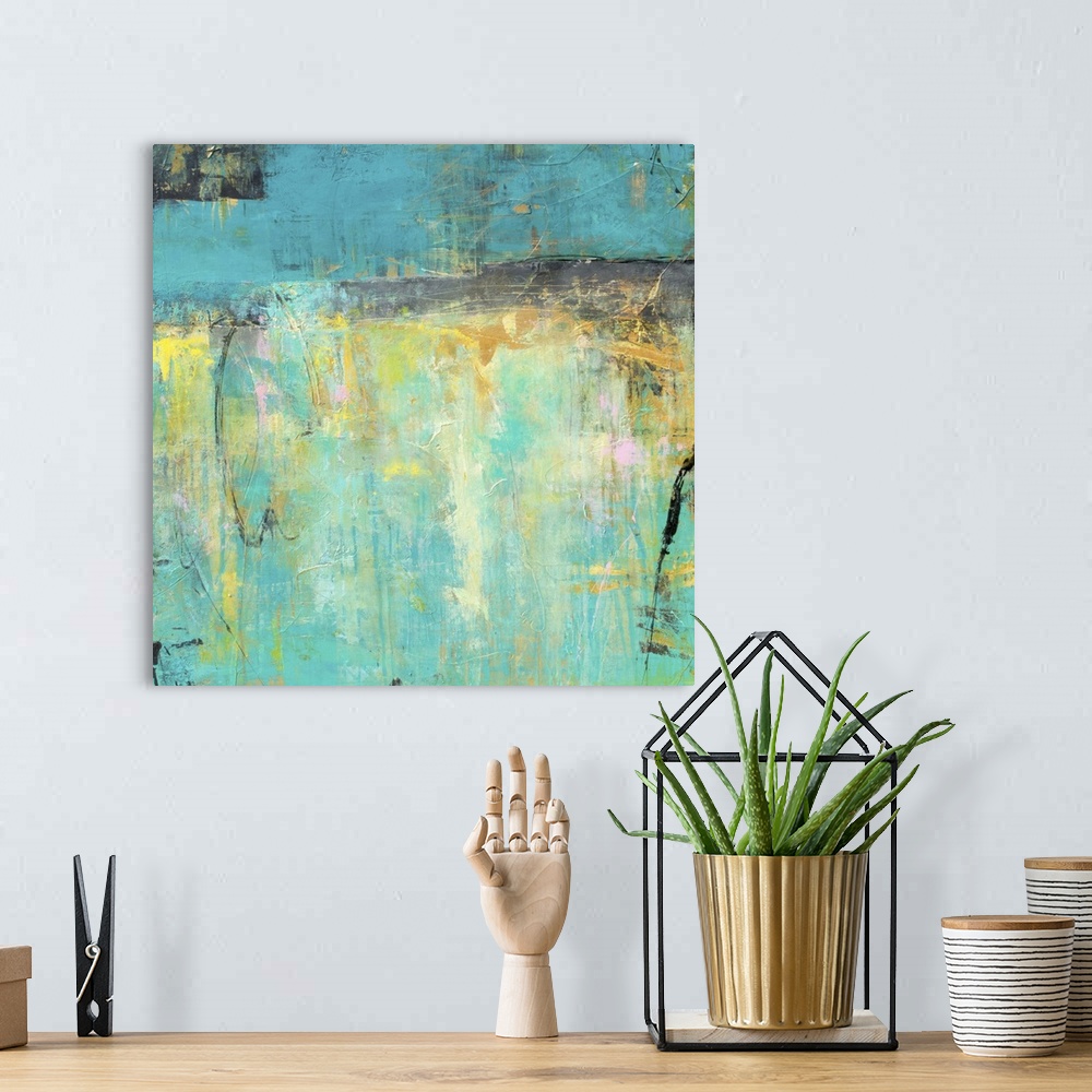 A bohemian room featuring A square contemporary abstract painting with a variety of blue and yellow hues in combination wit...