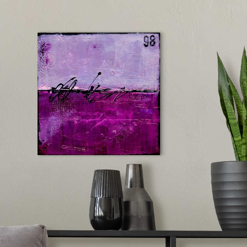 A modern room featuring Abstract painting with a bright purple and lavendar splitting the painting in half with a thin, b...