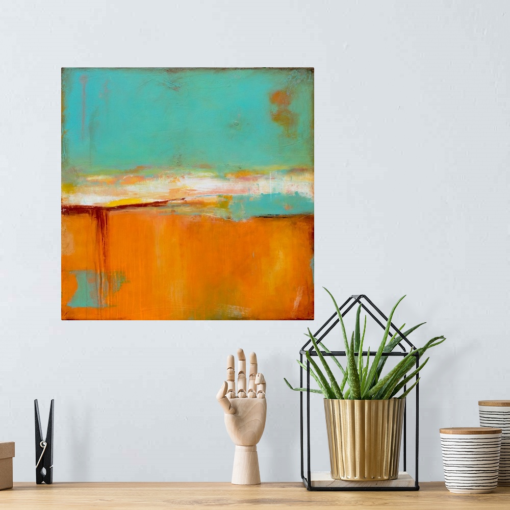 A bohemian room featuring Square abstract painting with light blue on the top, a white band separating the top from the bot...
