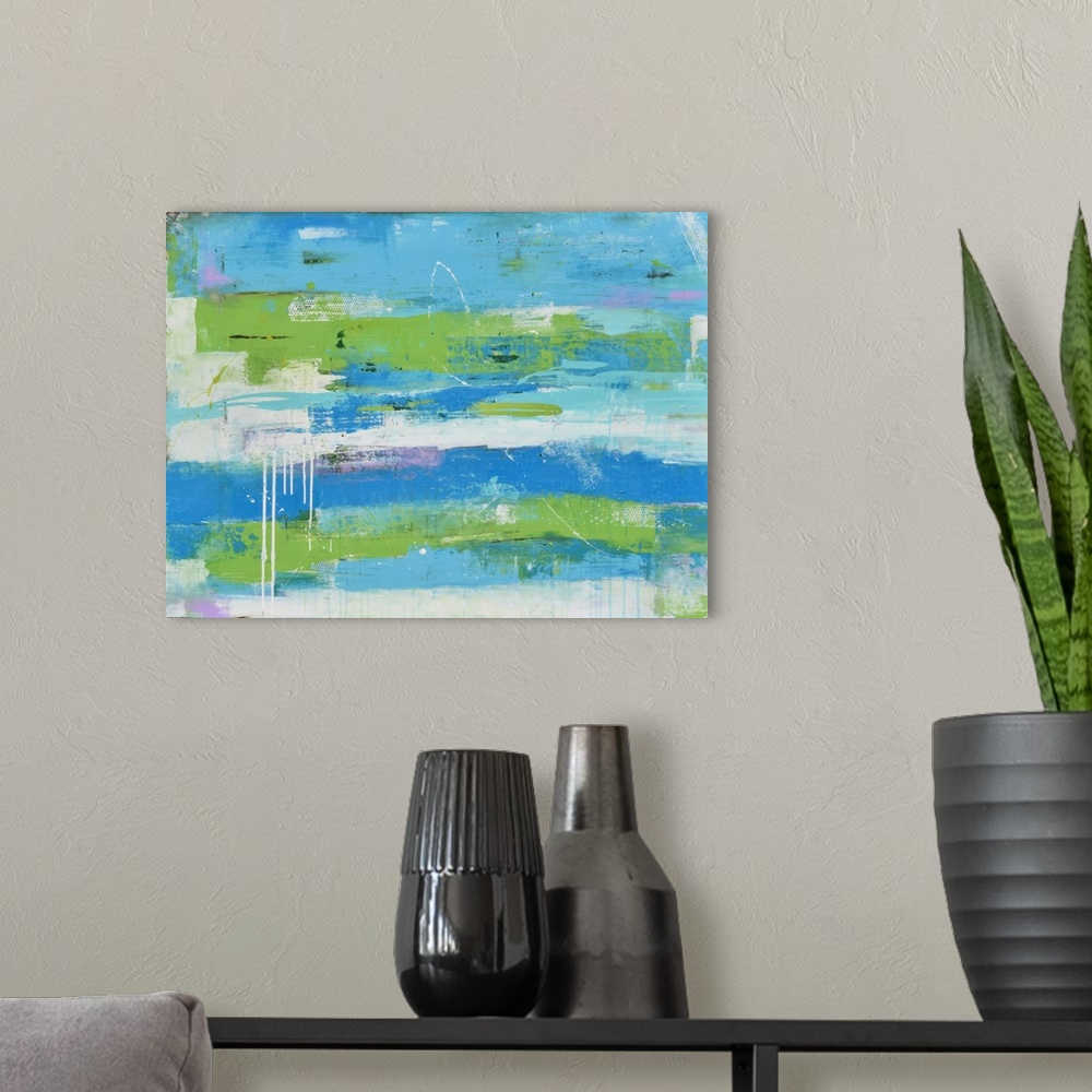 A modern room featuring Contemporary abstract painting using blues and greens in a horizontal swiping motion.