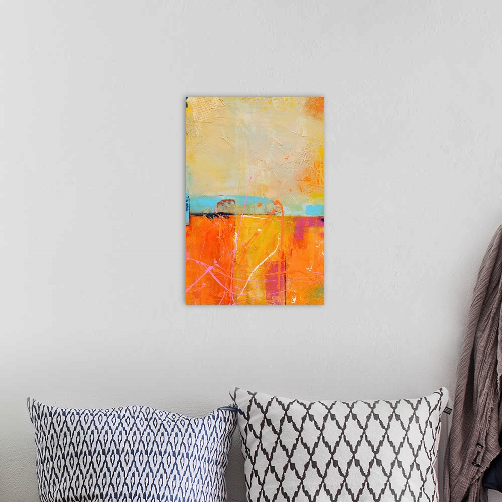A bohemian room featuring A vertical abstract painting that has a candy color palate with layered textures and colors divid...