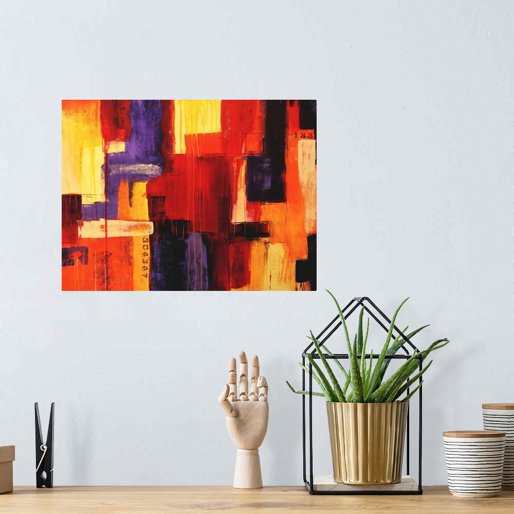 A bohemian room featuring Large abstract painting of various colored large brushstrokes put together on canvas.