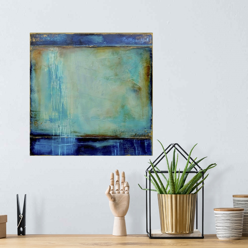 A bohemian room featuring Abstract contemporary art print in color blocks of navy blue and textured turquoise.