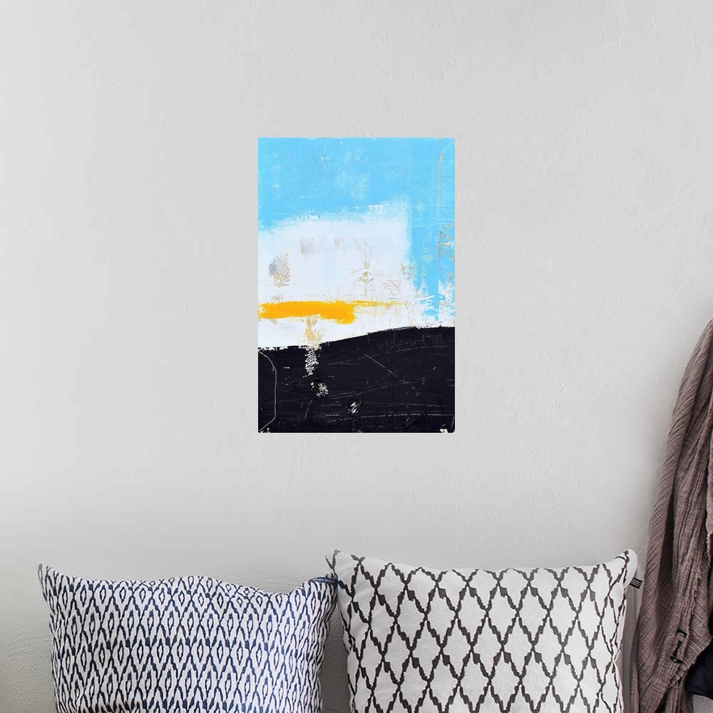 A bohemian room featuring A contemporary abstract painting using light blue, white and black with a pop of yellow.