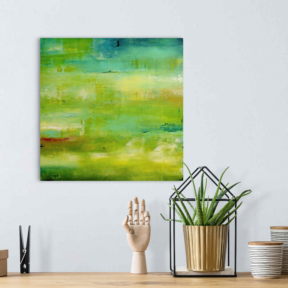 A bohemian room featuring Contemporary abstract painting using vibrant green tones.